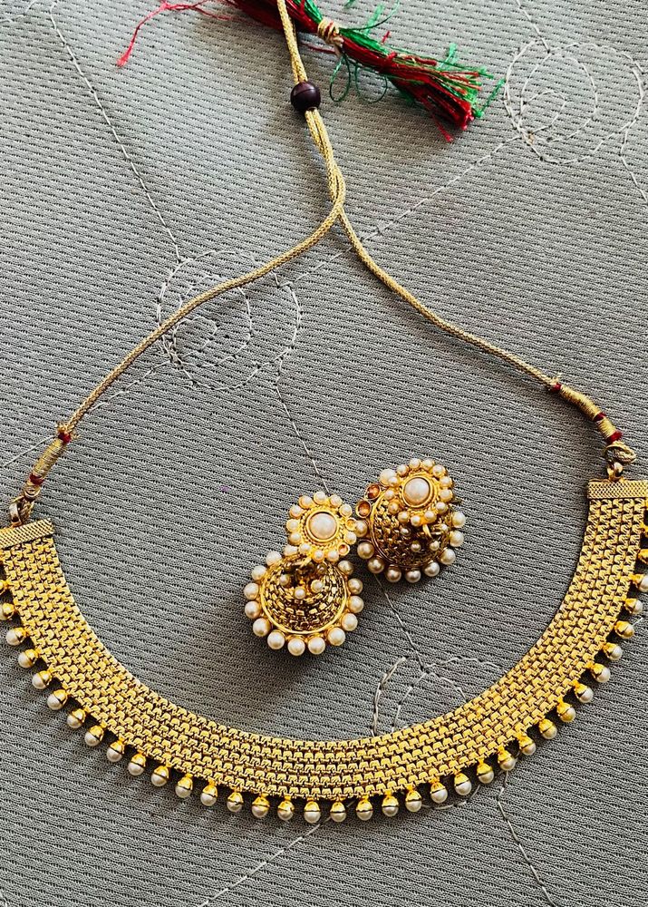 gold jewellery necklace with earrings
