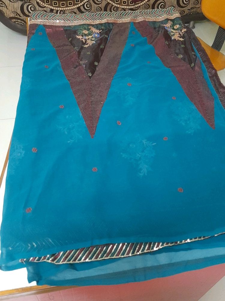 Party Wear Saree.Belive Me Its Too Preety, I Dont Wear Sarees So M Selling.Beautiful Sequence Pattern.colour Is Dark Green ,not Blue