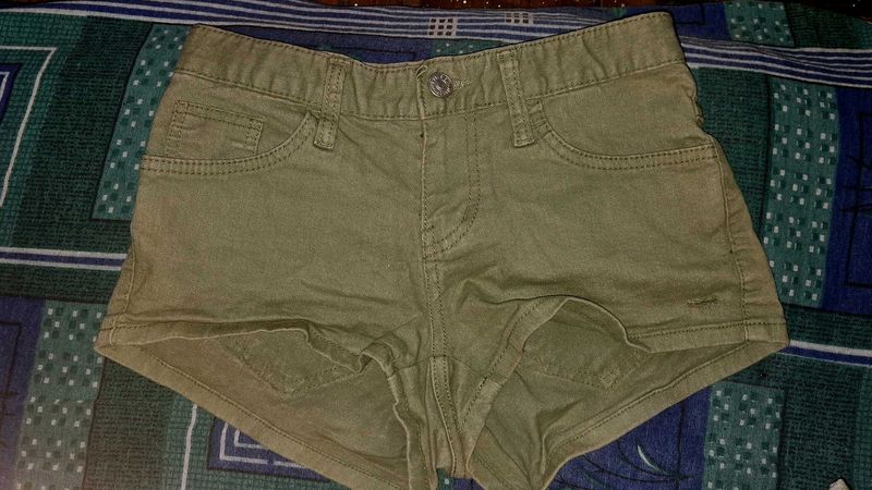 green denim shorts