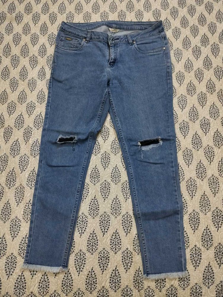 Distressed Blue Narrow Jeans