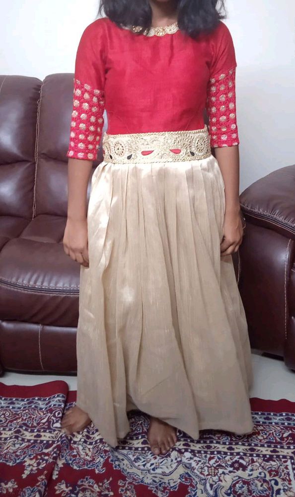 designer red and cream gown