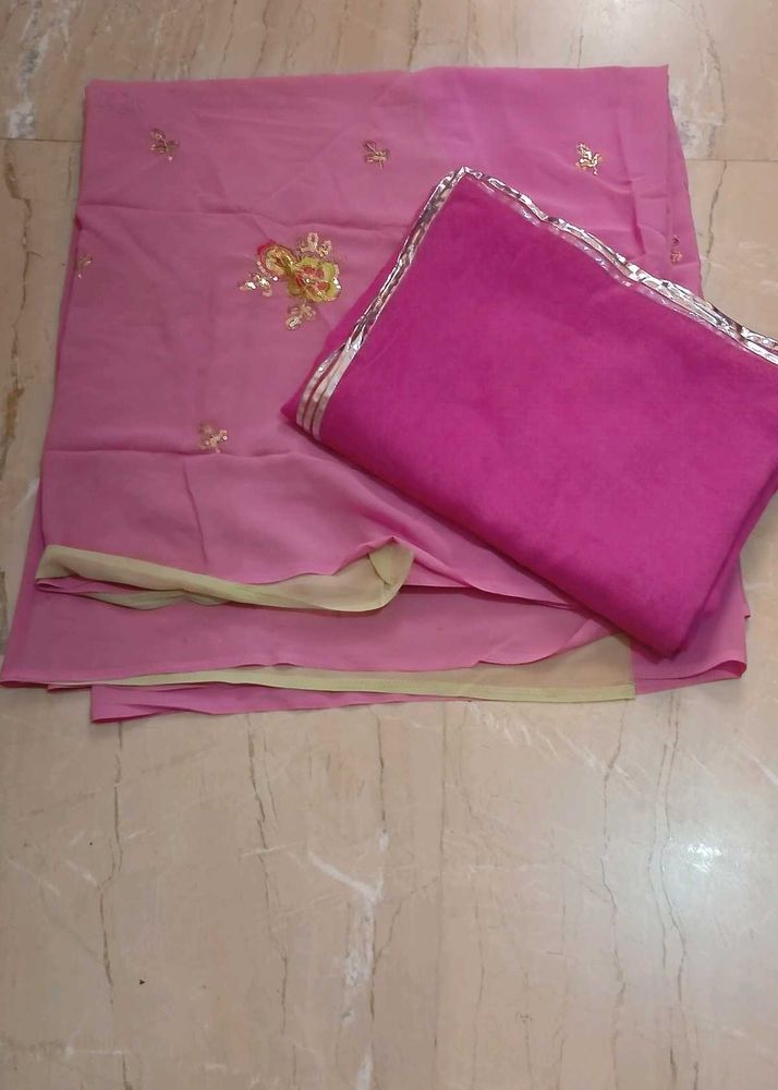 Pink rajputi dress material with blouse piece