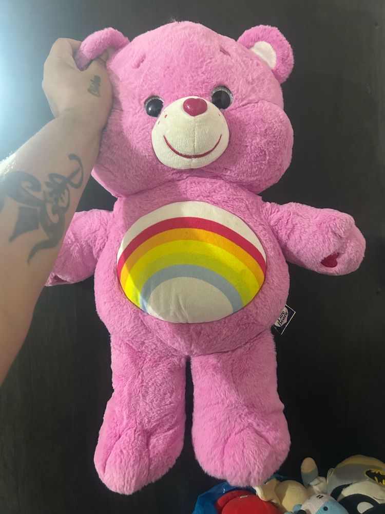 pink Care Bears Cheer Bear plush toy featuring a
