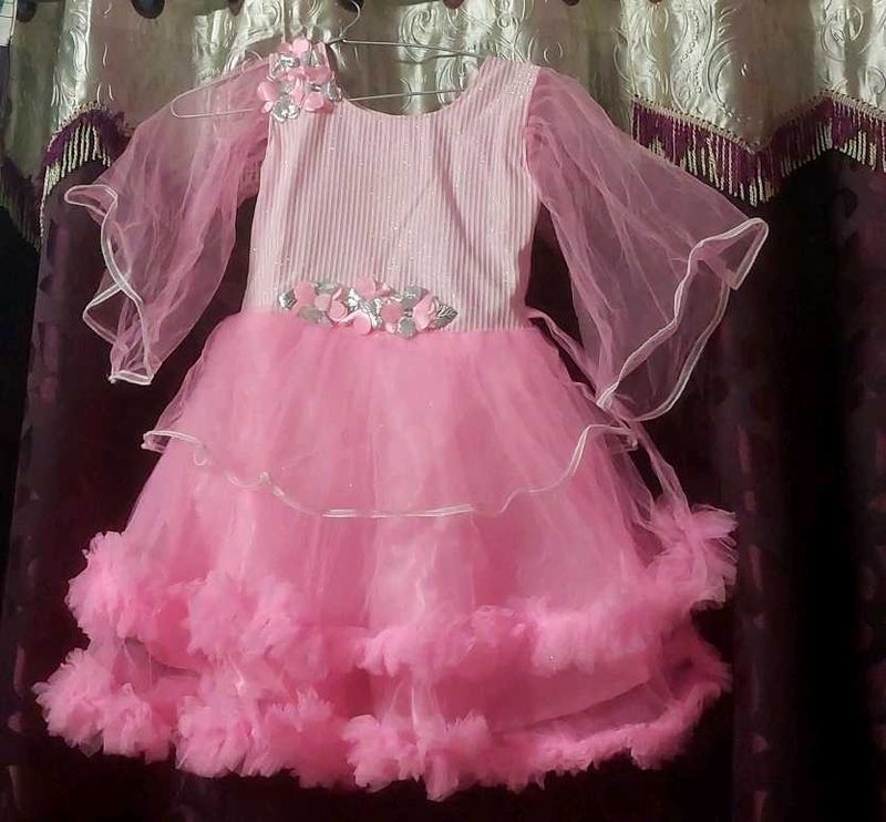 Stylish baby pink colored party wear frock