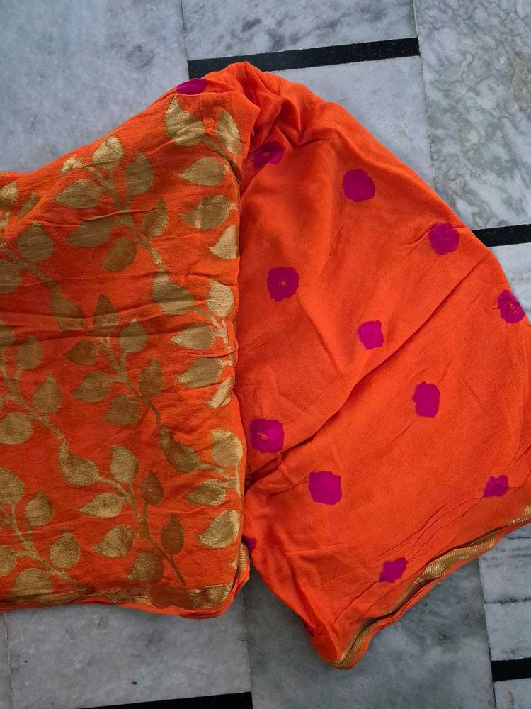 Vibrant Orange Saree with Gold &amp; Pink Accents
