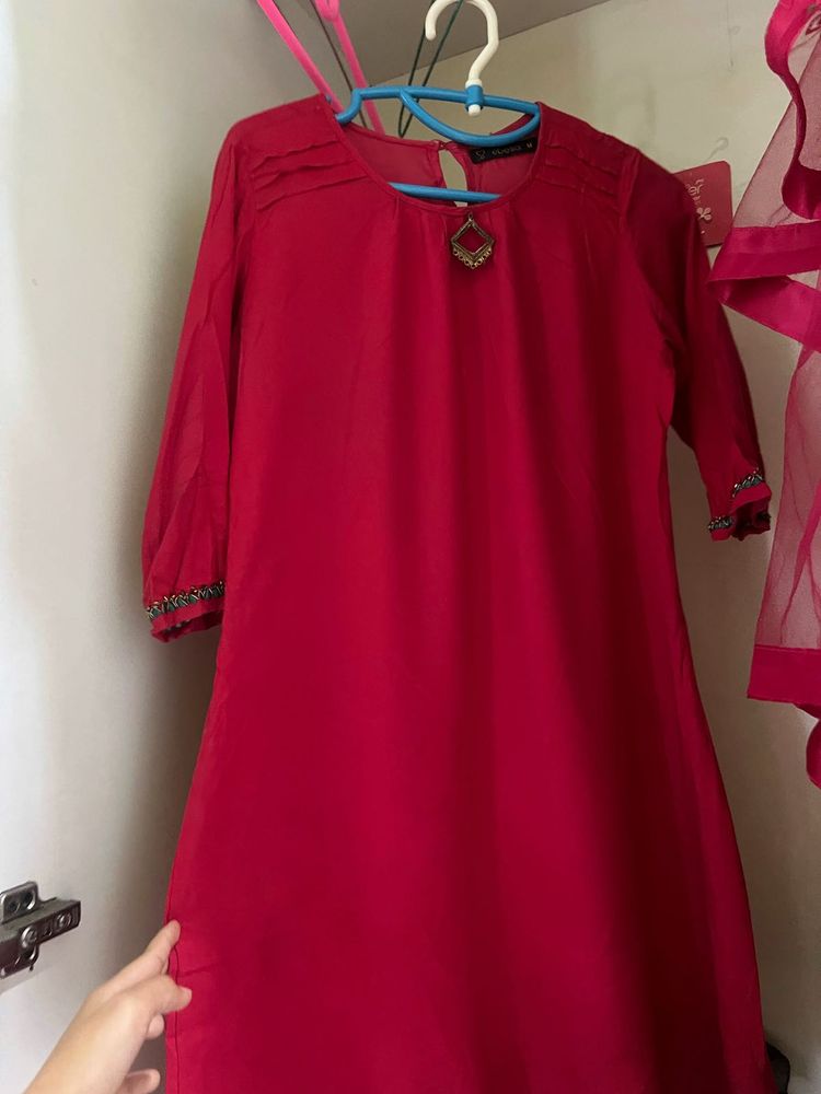 Elegant Ruby Red Kurti with embellished Sleeves