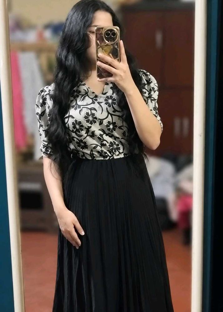 Elegant Floral Print Gown with Pleated Skirt