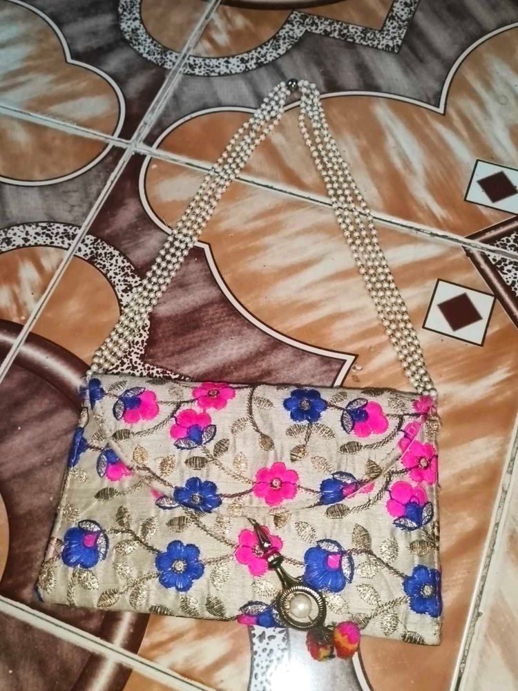 Embroidered Clutch with Pearl Strap