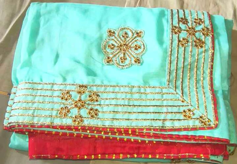Beautiful Teal Saree with Gold Embroidery