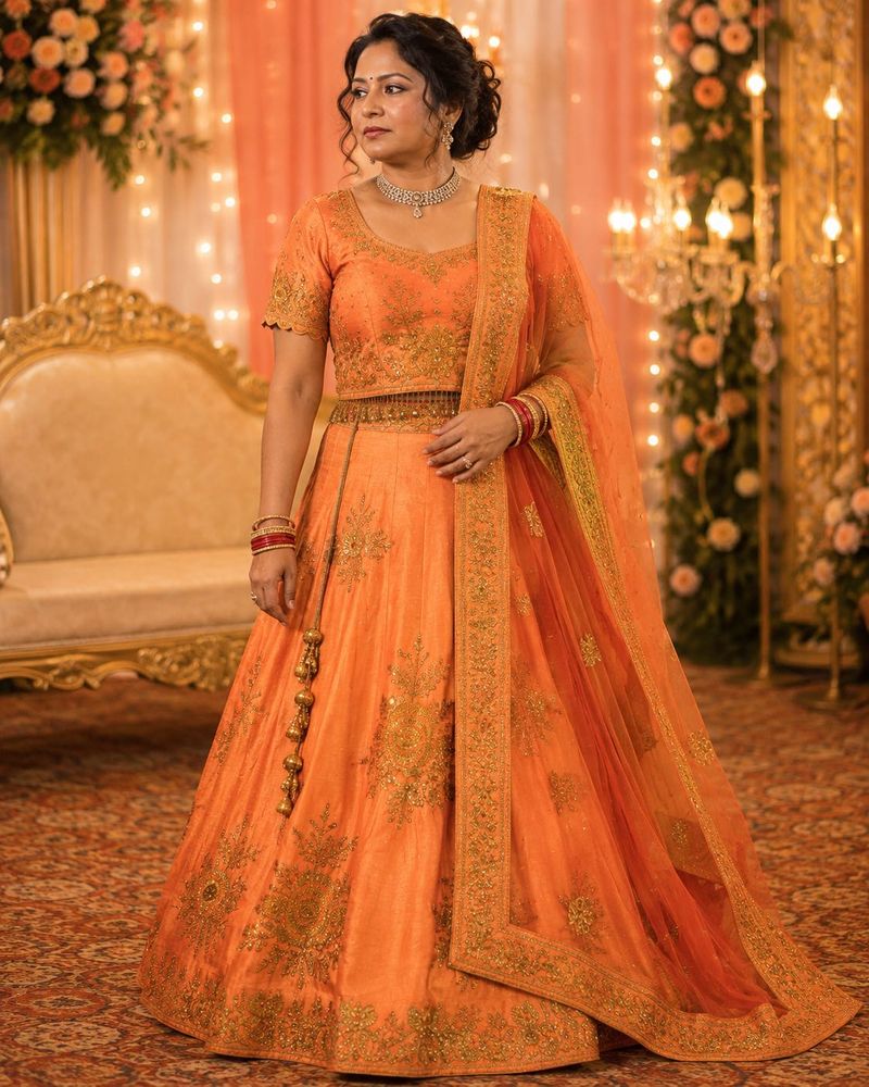 Stunning Orange Embroidered Lehenga Choli