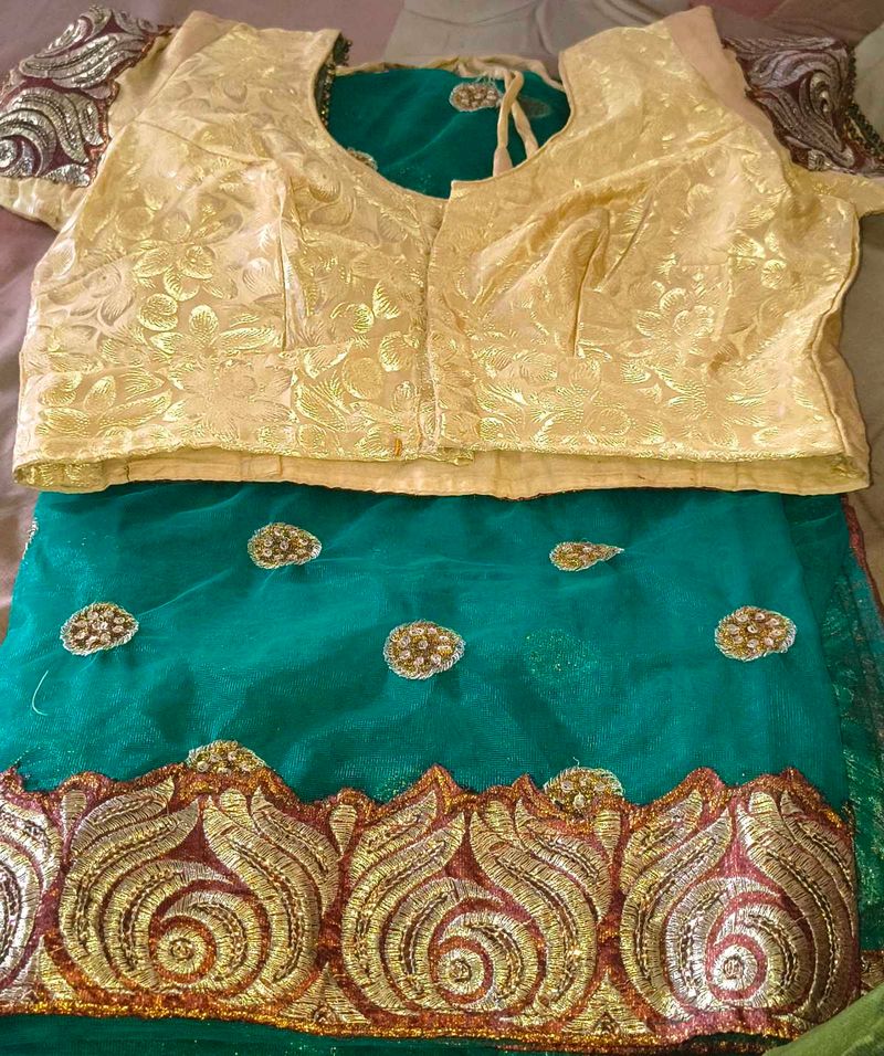 Elegant Teal Saree with Gold Blouse