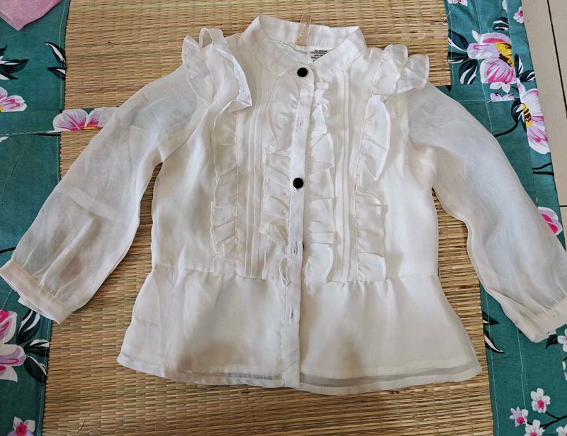Elegant White Ruffled Blouse