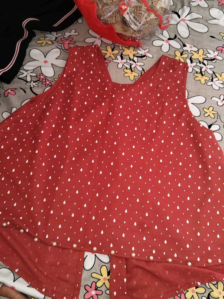 Chic Red Printed Top with Pearl Detail