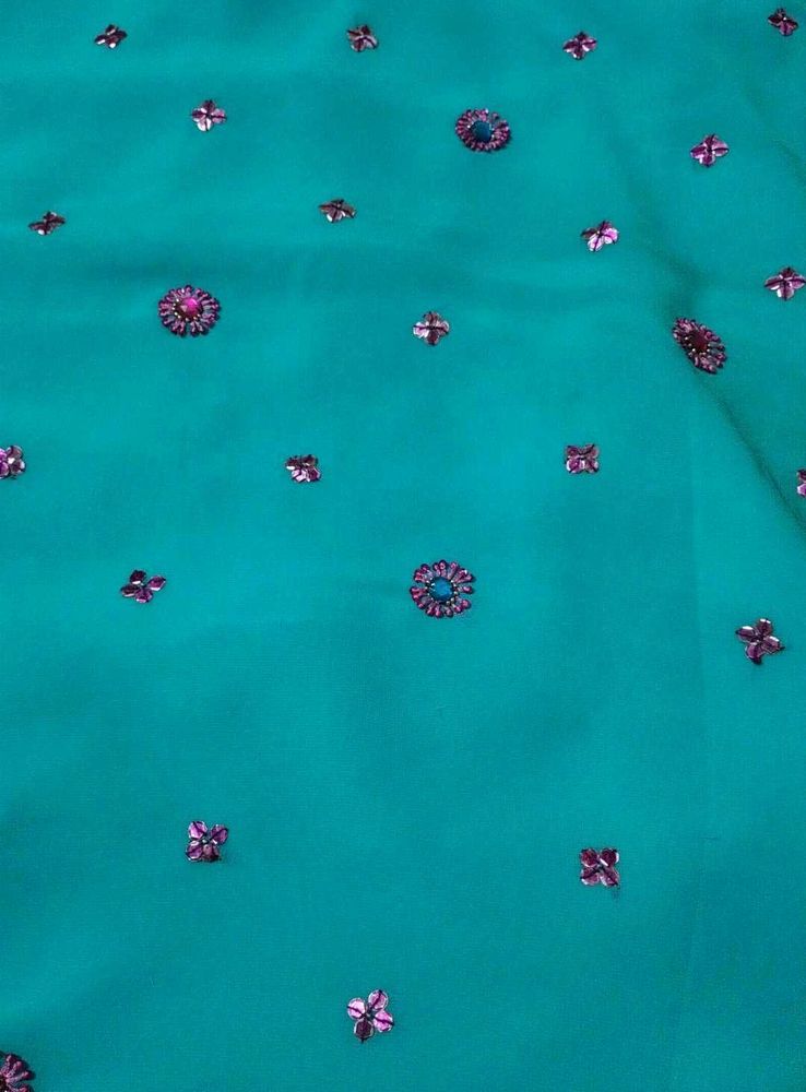 Stunning Teal Saree with Embellishments