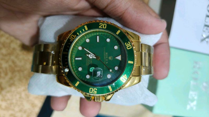Luxury Gold &amp; Green Rolex Watch