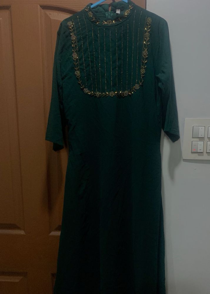 Elegant Green Kurta with Embellished Neckline