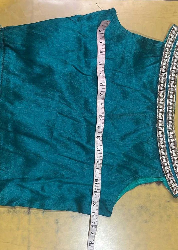 Teal blue blouse with embellishments