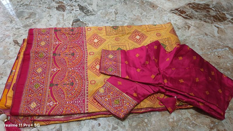 Vibrant Yellow Saree with Pink Blouse