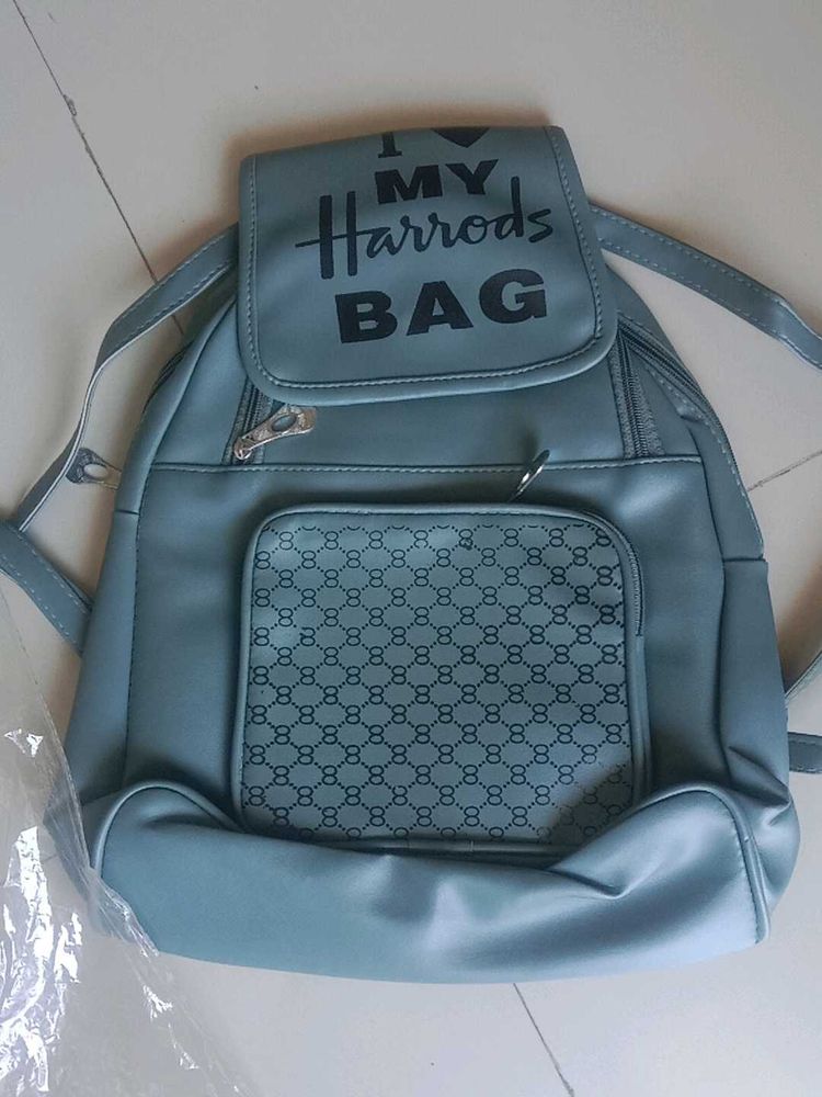 Stylish Blue Backpack with "I Love My Harrods Bag"