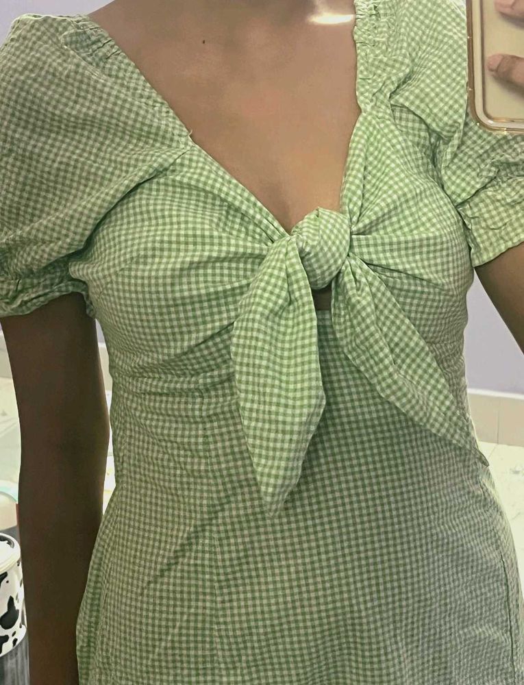 Green tie on summer dress