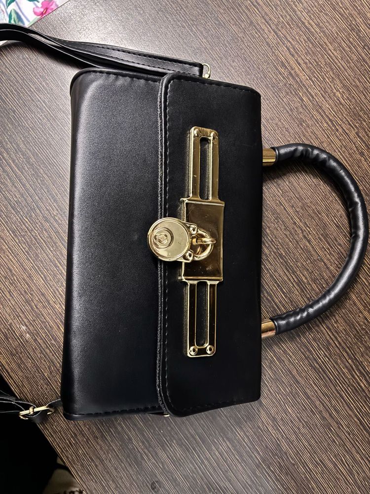 Chic Black Handbag with Gold Lock (Dubai product)