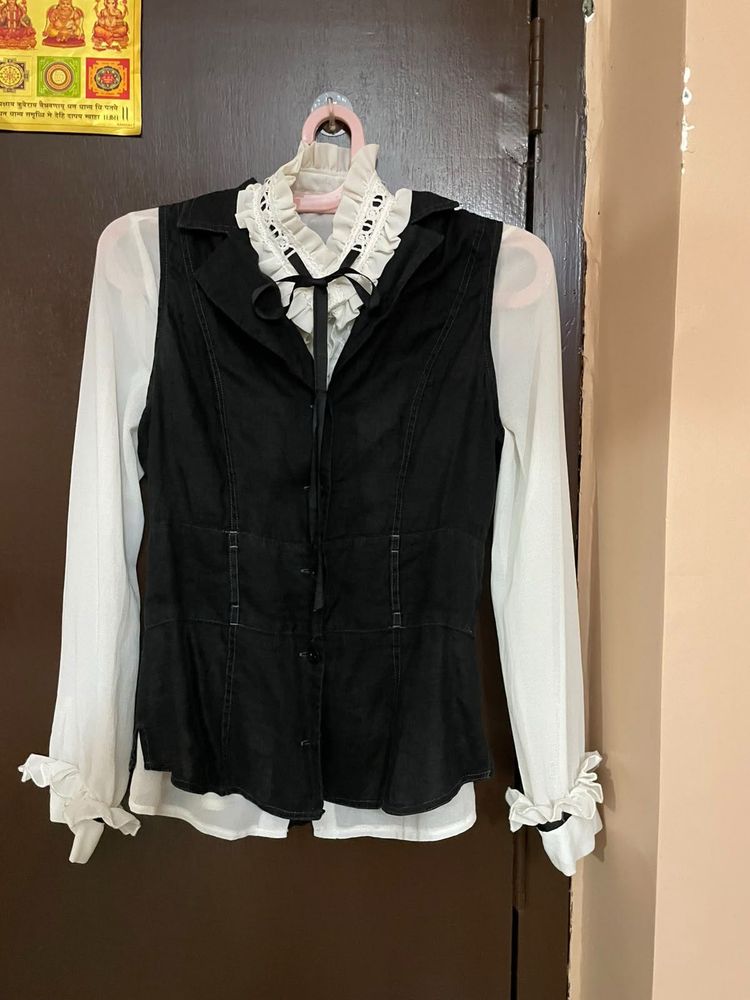 Black Vest with White Ruffle Blouse