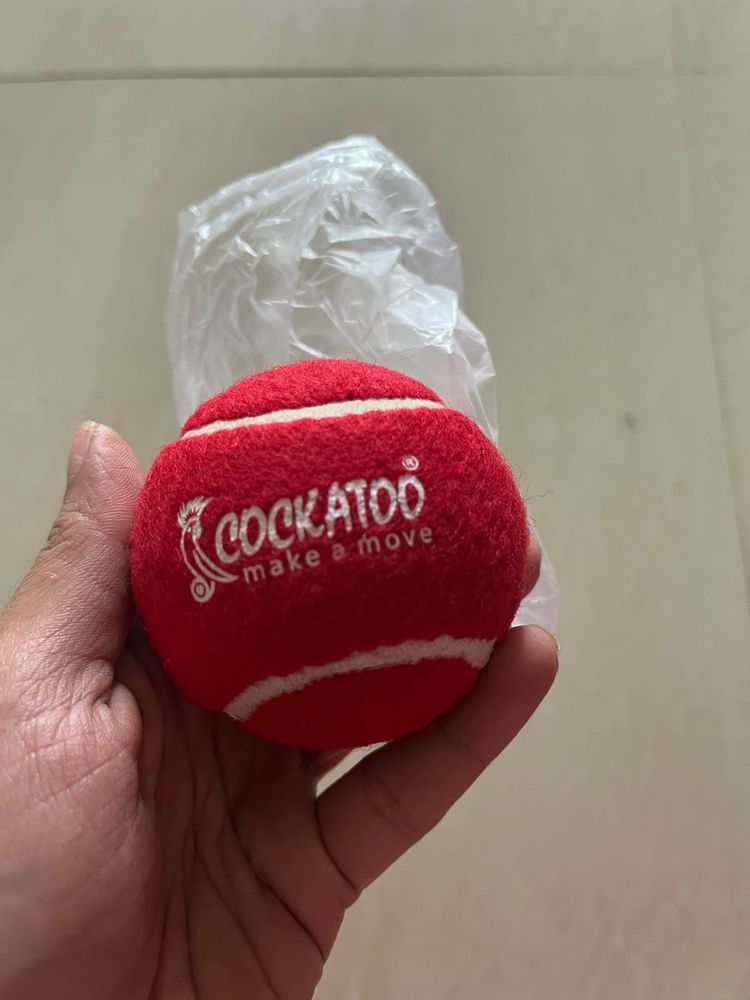 Red Cockatoo cricket/ Tennis Ball