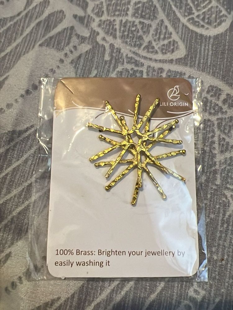 Unique Starburst Brass Jewelry Piece