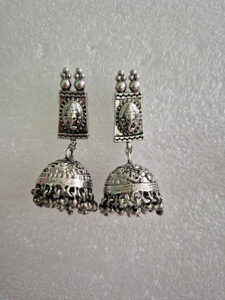 Exquisite Jhumka Earrings with Ganesha Motif