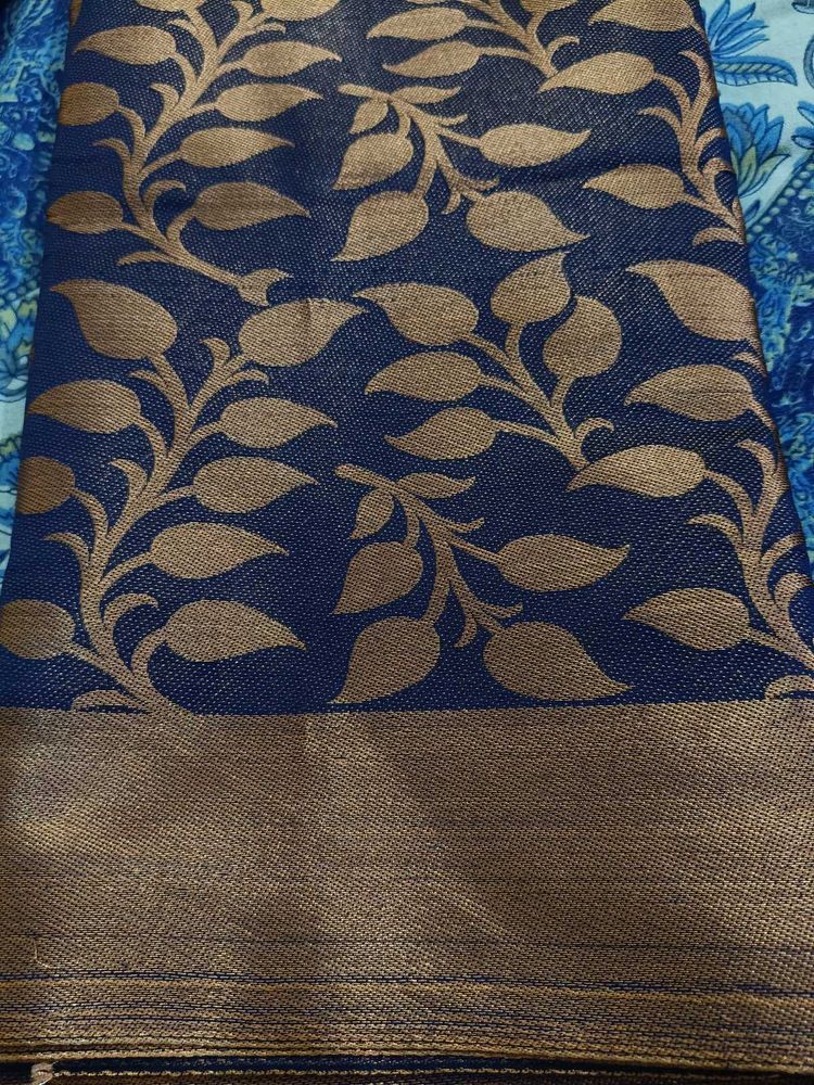Elegant Blue Saree with Golden Leaf Motifs