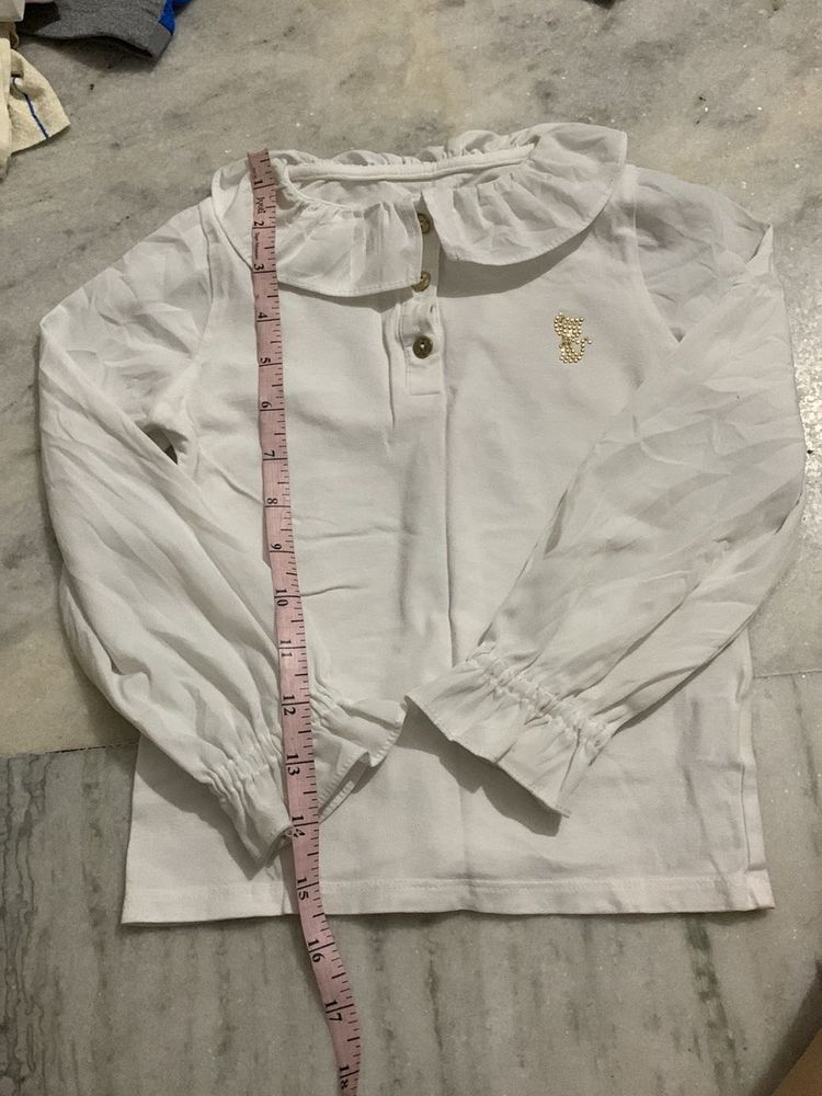 girls white ruffle top