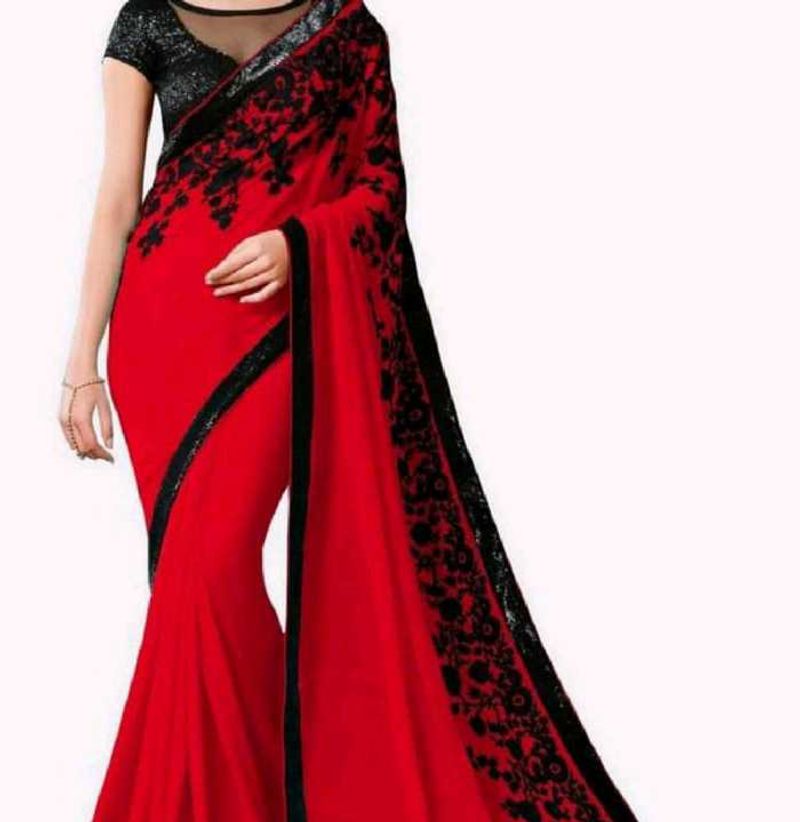 a beautiful red saree with blouse