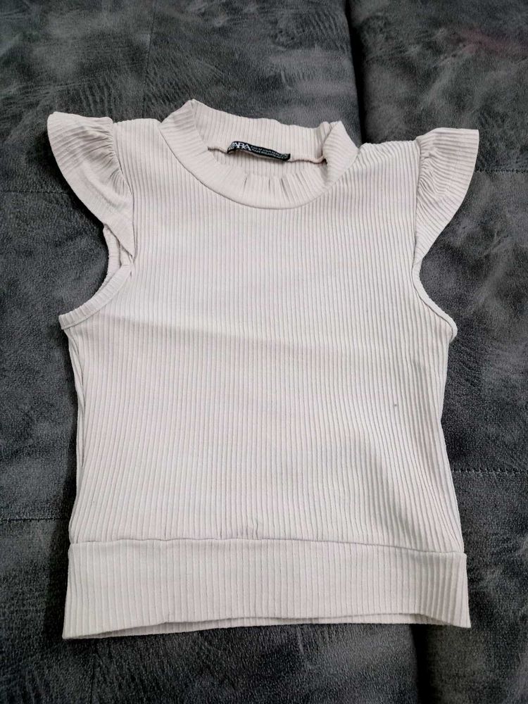 Ribbed Mock Neck Flutter Sleeve Top