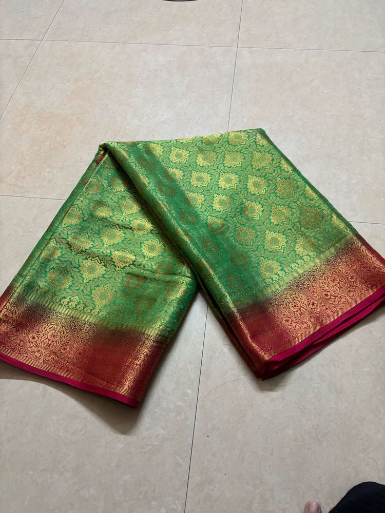 Green Silk Saree with Gold Border