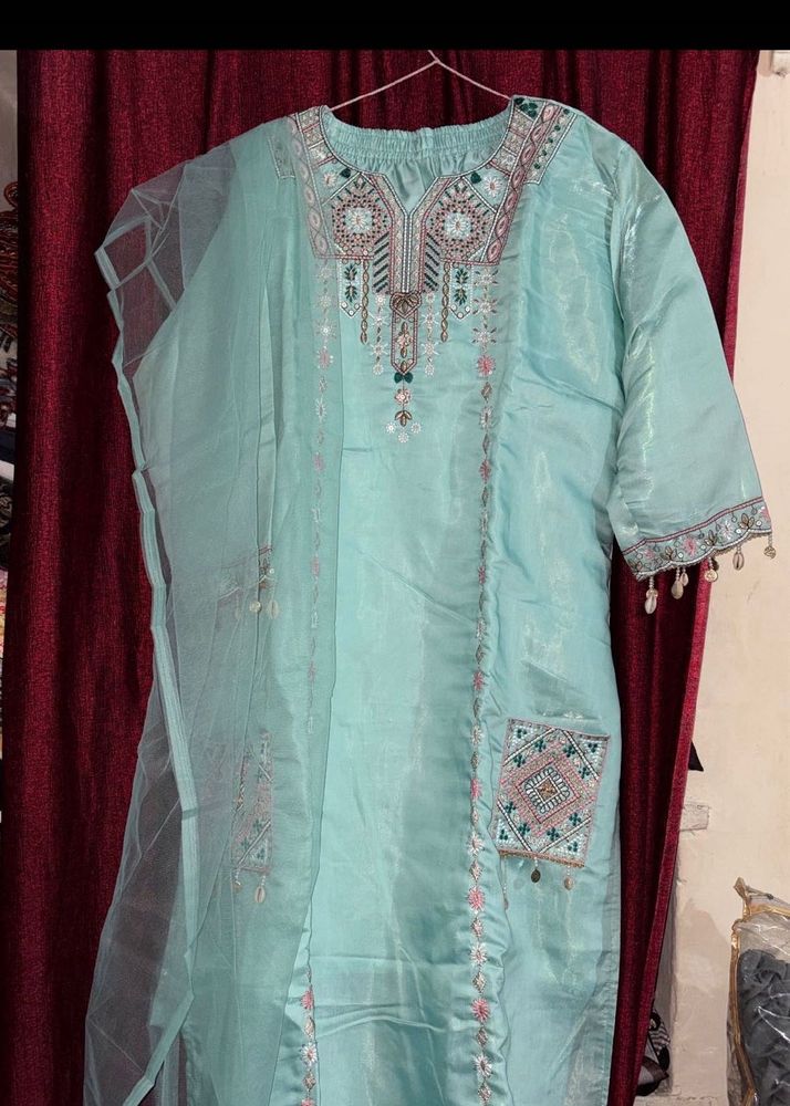 Elegant Teal Kurta Set with Intricate Embroidery