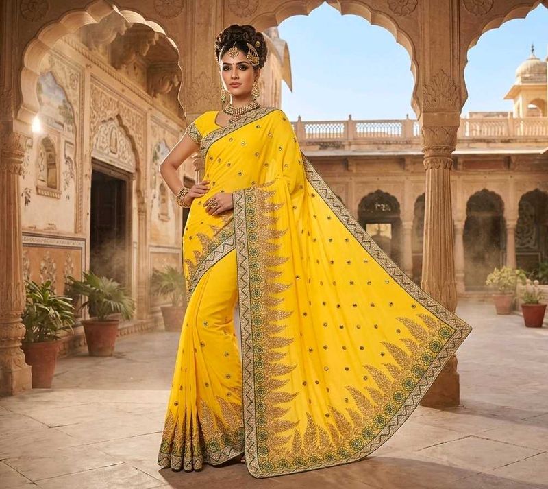 Vibrant Yellow Embroidered Saree with matching blo