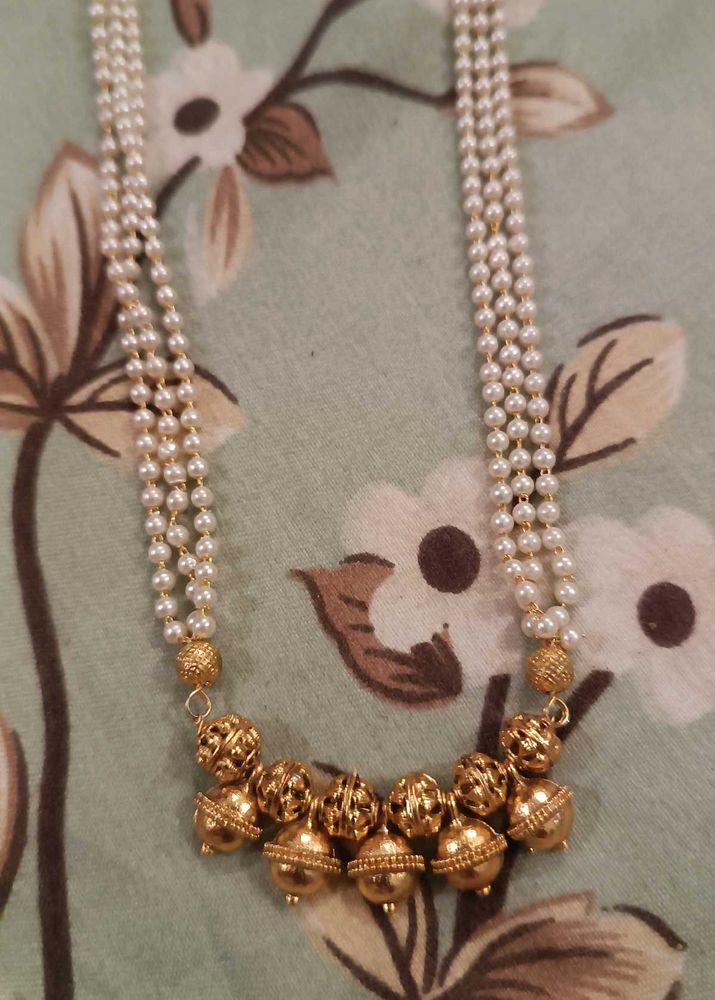 haram with white pearls