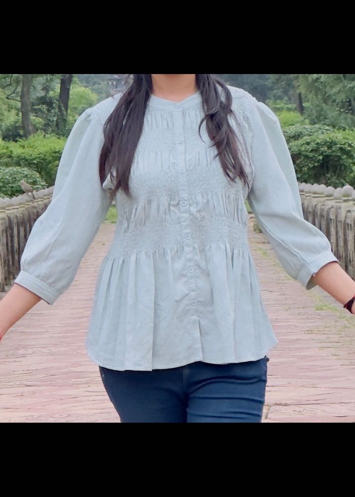 Chic Smocked Peplum Top