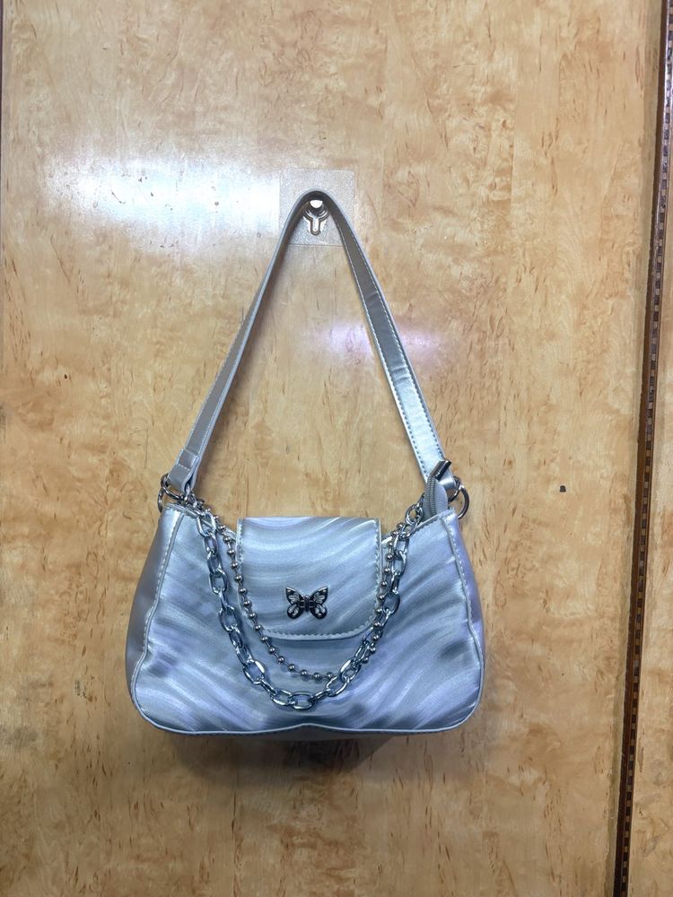silver shoulder bag