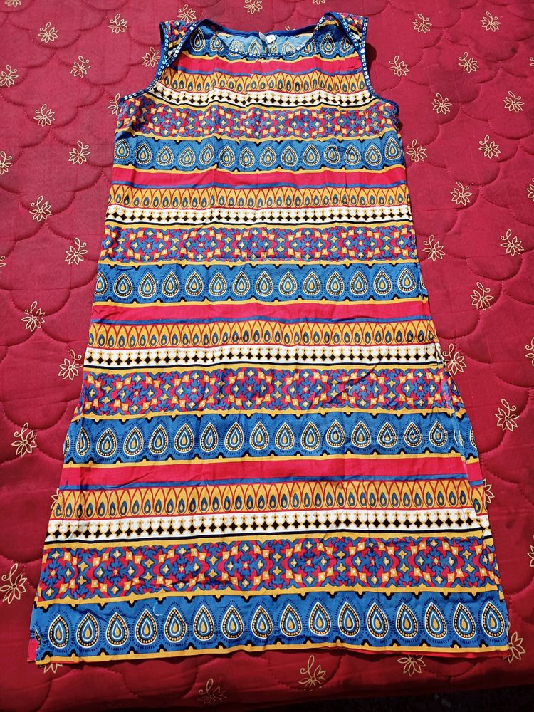 INDIDORI Brand, Multi Coloured Kurti With Beautiful 'chumki' Design On The Neck And Bottom Part.