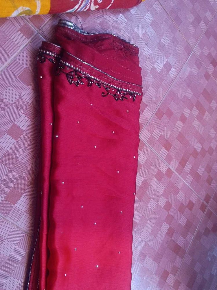 Elegant Red Saree with Crystal Embellishments
