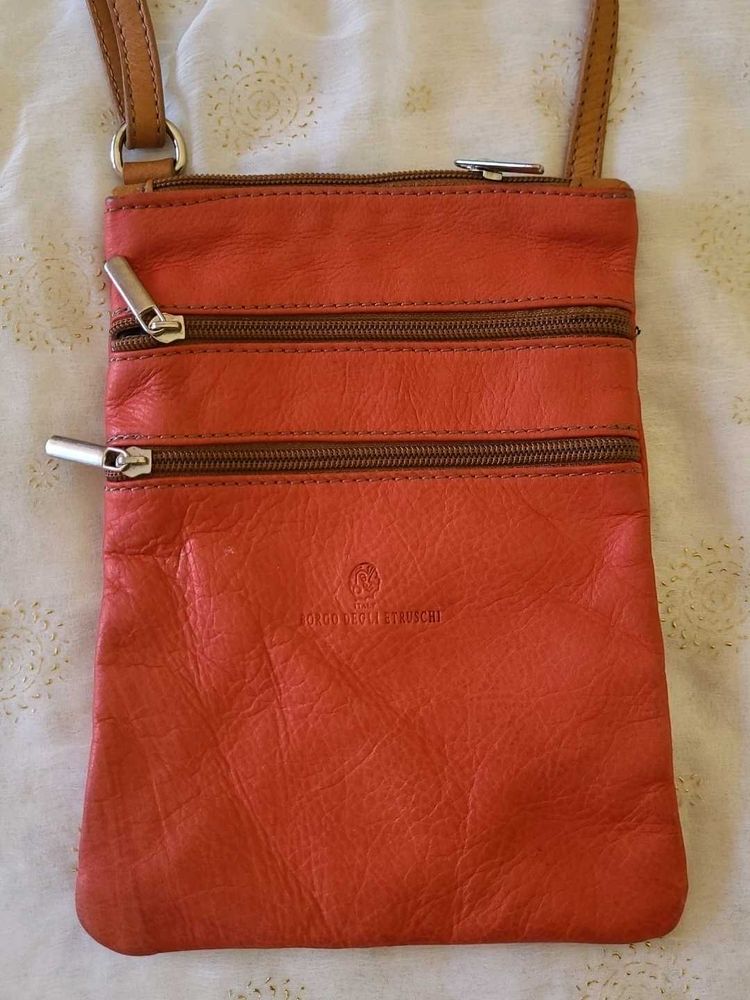 Branded Vibrant Orange Leather Sling Bag