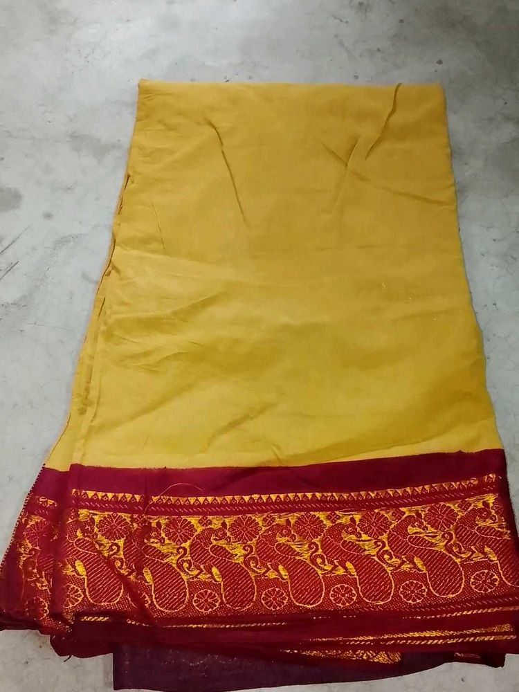 Beautiful Yellow Saree with Red Border