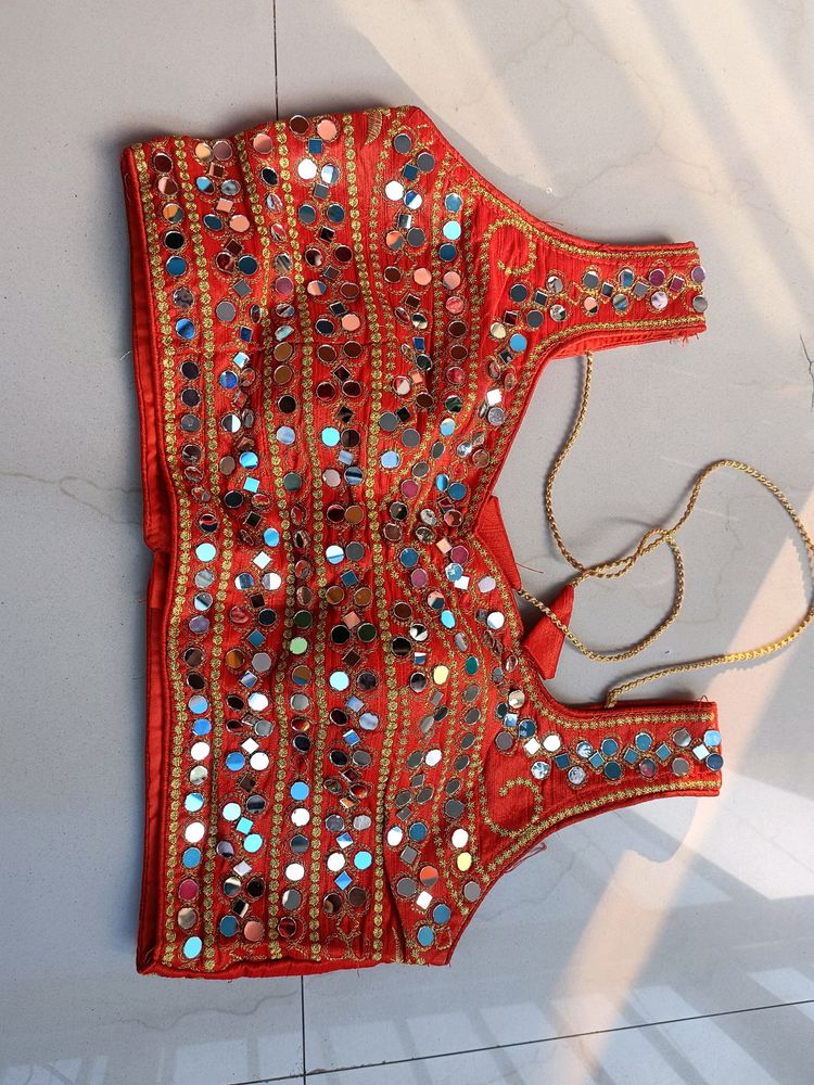 orange mirror work sleeveless blouse