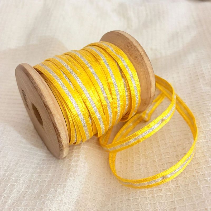 Yellow saree border with golden Silver Stripes