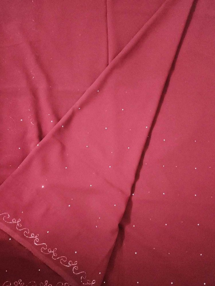 Elegant Maroon Saree with Embellishments