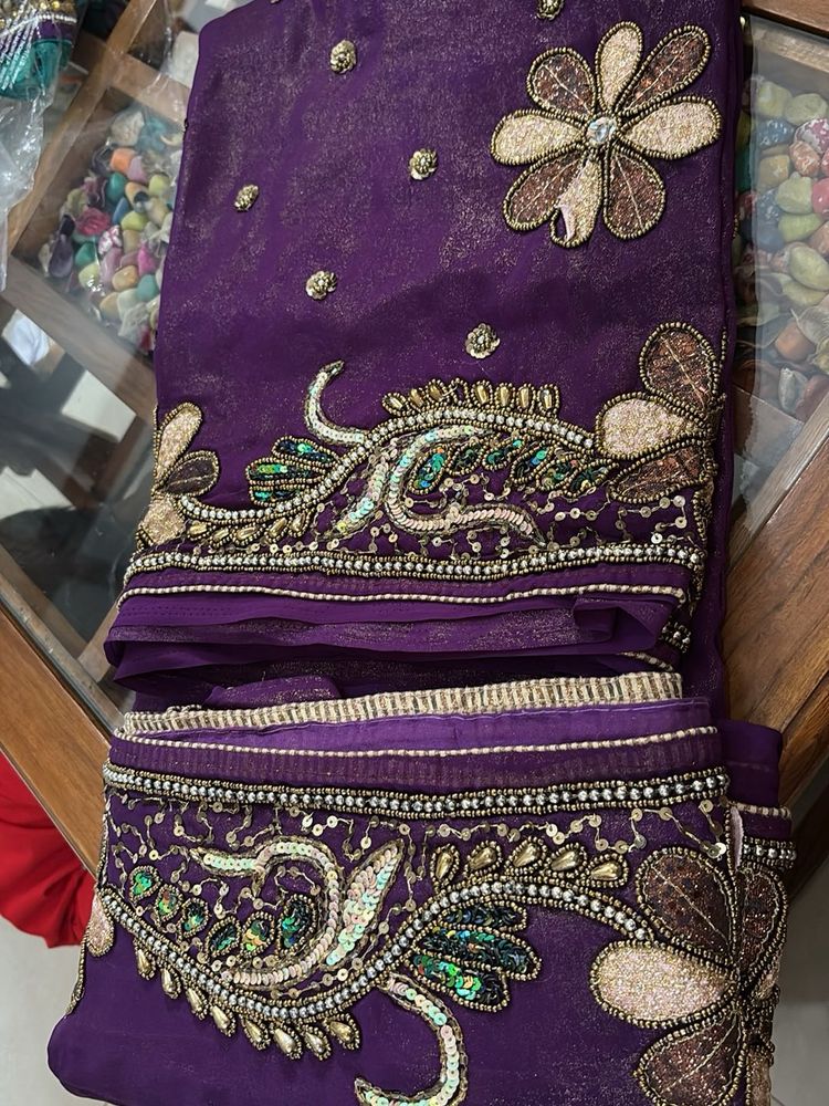 Exquisite Purple Embellished Saree