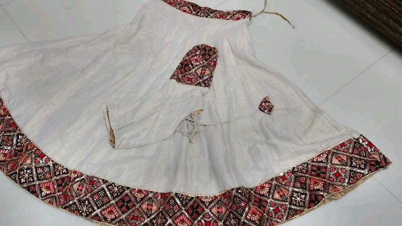 Elegant White Lehenga with Embellished Border