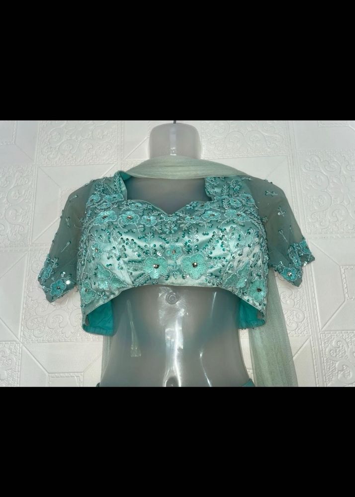 Exquisite Teal Embroidered Lehenga Choli Set