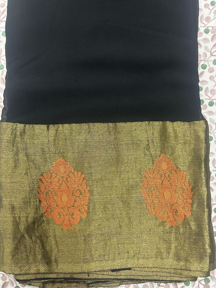 Elegant Black Saree with Gold Border